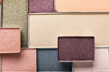 Güzel göz farı dolum kapları arka plan olarak, üst görünüm