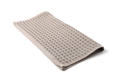 Temiz kahverengi waffle havlusu beyaza izole edilmiş.