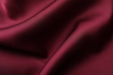Buruşuk bordo ipek kumaş arka plan olarak, üst görünüm