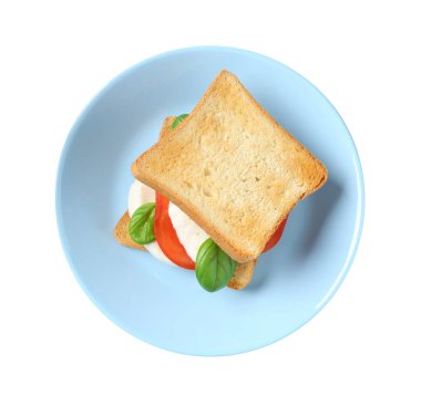 Beyaz arka planda mozarella peynirli, domatesli ve fesleğenli lezzetli sandviç.