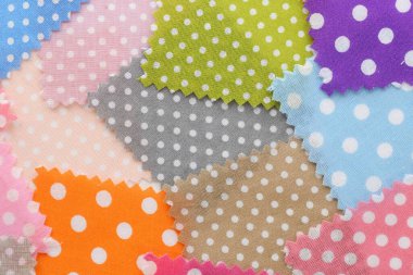 Arka plan olarak farklı kumaş örnekleri, üst görünüm