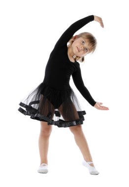 sevimli küçük kız beyaz arka plan üzerinde dans