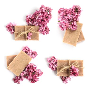 Sabun çubukları ve beyaza izole edilmiş aromatik leylak çiçekleri, kolaj. Üst görünüm