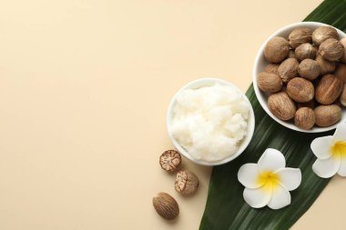 Bej arka planda doğal Shea yağı, düz. Metin için boşluk