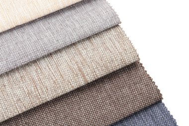 Beyaz üzerinde izole edilmiş farklı kumaş örnekleri