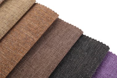 Beyaz üzerinde izole edilmiş farklı kumaş örnekleri