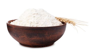 Kasede buğday unu ve beyaz arka planda çivi.