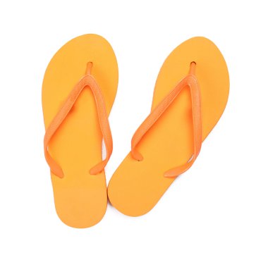 Süslü turuncu parmak arası terlikler, beyaz, üst manzara. Plaj aksesuarı