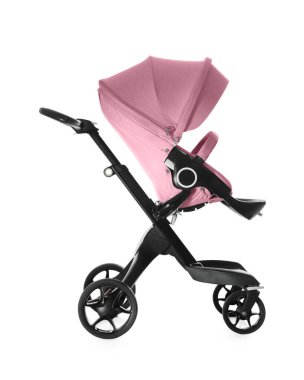 Bebek arabası. Beyaz tenteli pembe bebek arabası.