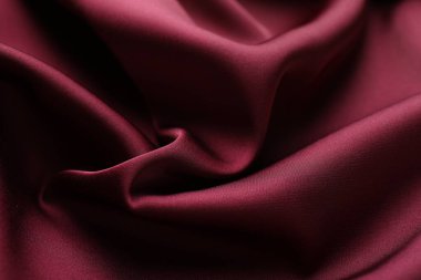 Buruşuk bordo ipek kumaş arka plan olarak, yakın plan