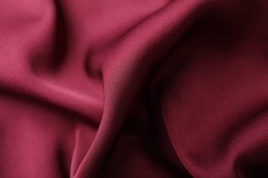Buruşuk bordo ipek kumaş arka plan olarak, üst görünüm