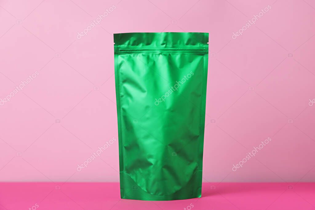 One zipper stand-up pouch on pink background. Mockup for design