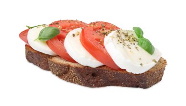 Peynirli, domatesli, fesleğenli ve baharatlı lezzetli sandviç.