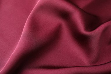 Buruşuk bordo ipek kumaş arka plan olarak, üst görünüm