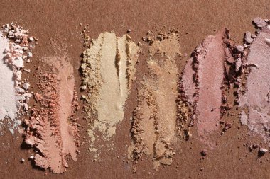 Kahverengi arka planda farklı göz farı lekeleri, düz yatış