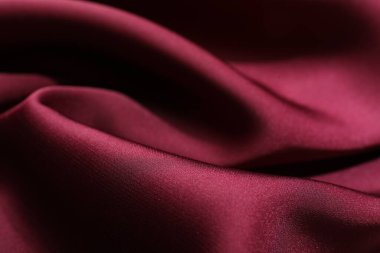 Buruşuk bordo ipek kumaş arka plan olarak, yakın plan