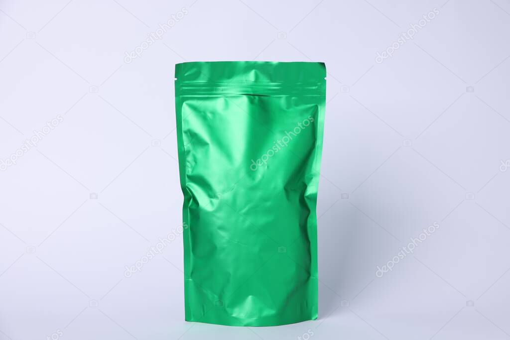 One zipper stand-up pouch on light grey background. Mockup for design