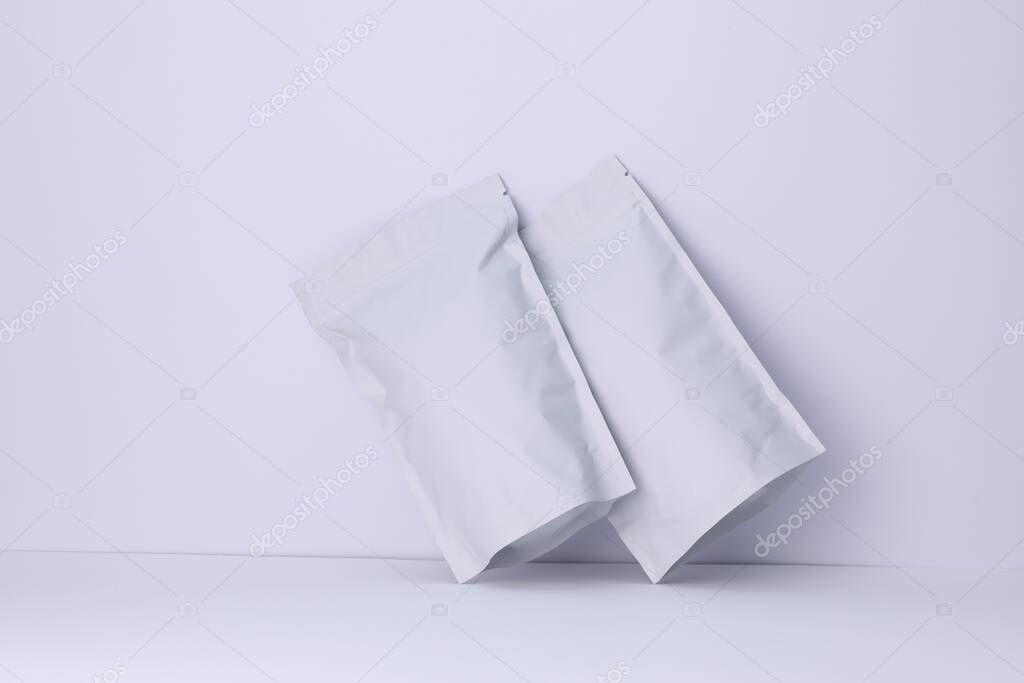 Zipper stand-up pouches on white background. Mockup for design