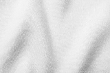 Arkaplan olarak beyaz kumaşın dokusu, üst görünüm