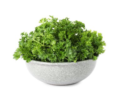 Beyaz tenceredeki taze maydanoz.