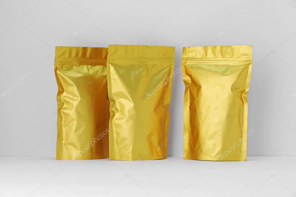 Zipper stand-up pouches on white background. Mockup for design