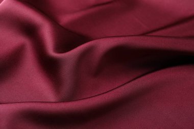 Buruşuk bordo ipek kumaş arka plan olarak, yakın plan