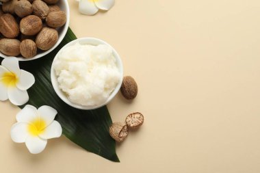 Bej arka planda doğal Shea yağı, düz. Metin için boşluk