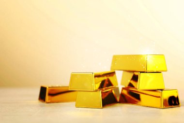 Bej arka planda parlak altın külçeler. Metin için boşluk