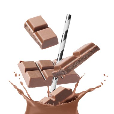 Çikolatalı süt, saman ve çikolata parçalarını beyaz arka plana sıçratıyorum.