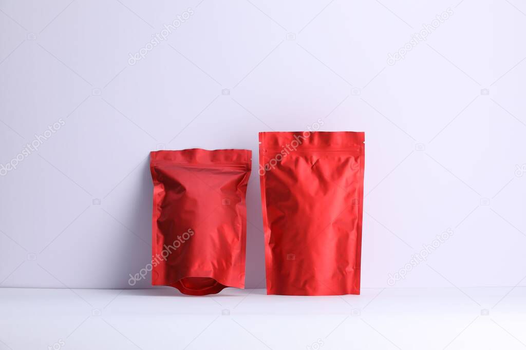 Zipper stand-up pouches on white background. Mockup for design