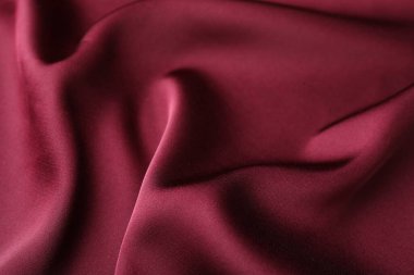 Buruşuk bordo ipek kumaş arka plan olarak, yakın plan