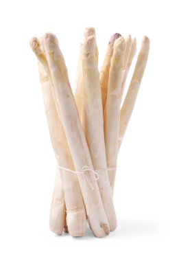 Bir grup çiğ kuşkonmaz mızrağı beyaza saplanmış.