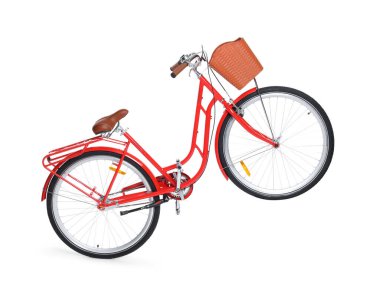 Beyaz arka planda sepeti olan bir bisiklet.