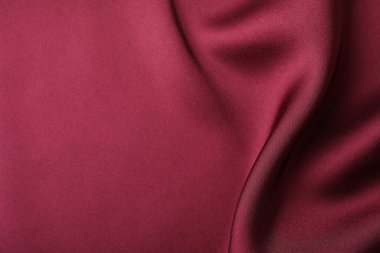 Buruşuk bordo ipek kumaş arka plan olarak, üst görünüm