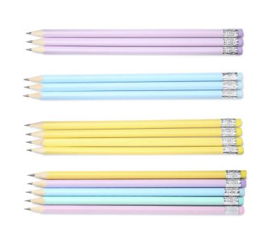 Beyaz zemin üzerinde birçok grafit kalem, set. Üst görünüm