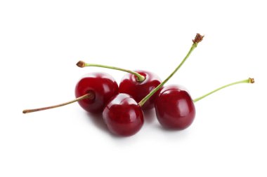 Birçok taze kiraz beyazda izole olur.