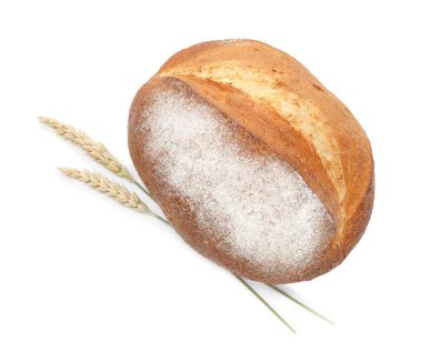 Bir somun taze ekmek ve dikenler beyaz, üst manzara izole