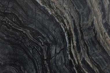Arkaplan olarak koyu mermer yüzeyin dokusu, üst görünüm