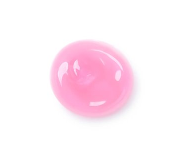 Pembe dudak parlatıcısı beyaz, üst görünümde izole edilmiş.