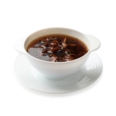 Beyaz tenceredeki lezzetli mantar çorbası.