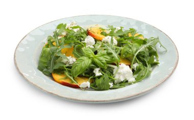 Lezzetli salata roka, peynir, şeftali ve fesleğen.