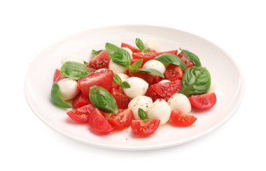 Peynirli, domatesli, fesleğenli ve baharatlı Caprese salatası.