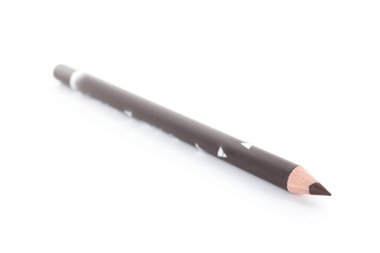 Bir kahverengi kaş kalemi beyaza izole edilmiş.