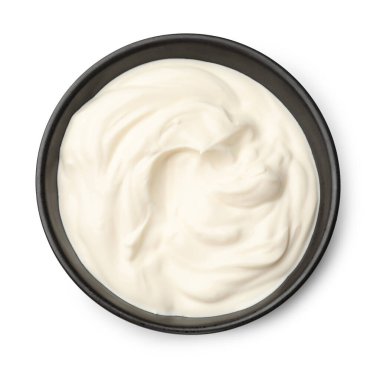 Beyaz tenceredeki leziz ekşi krema.