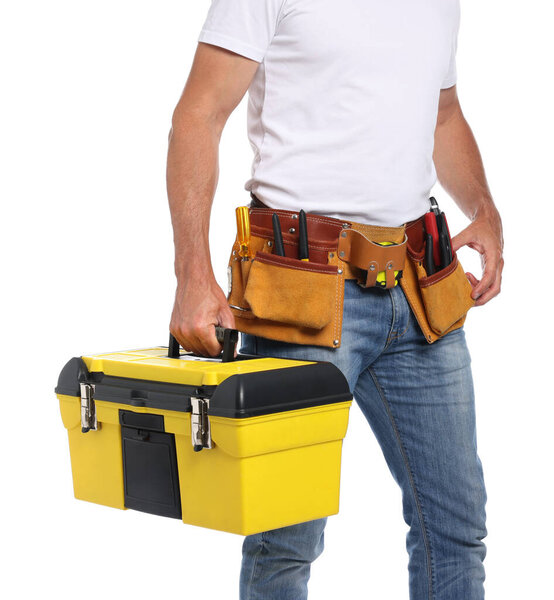 Professional repairman with tool box on white background, closeup