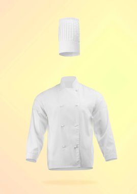 Şef üniforması sarı arka plana karşı havada. Ceket ve ceket.