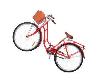 Beyaz arka planda sepeti olan bir bisiklet.