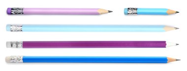 Beyaza izole edilmiş farklı grafit kalemler.