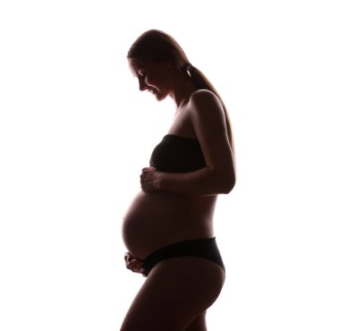 Beyaz arka planda hamile kadın silueti