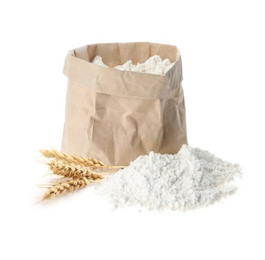 Beyaz arka planda buğday unu ve dikenler